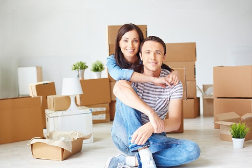 Building health and sustainability - happy couple looks forward to the future